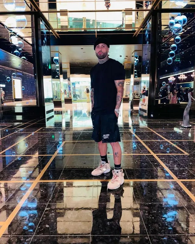 Nicky Jam outfit in Gallery Dept., Jordan, and Balenciaga, 2021