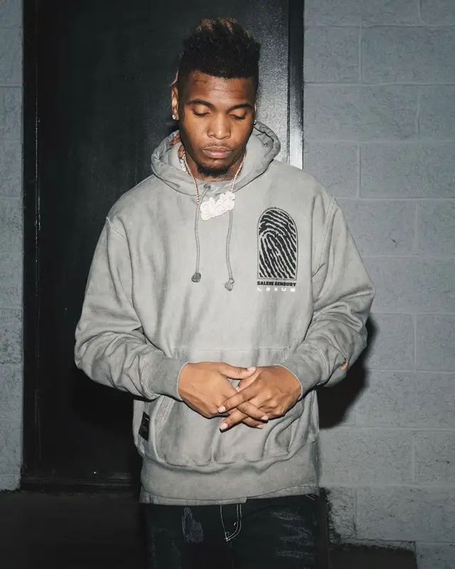 Lil Keed outfit in Lexus, Skins, and Nike, 2021