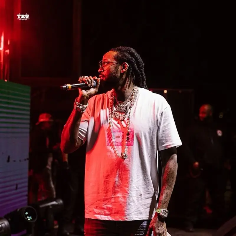 2 Chainz outfit in Supreme, Amiri, and Louis Vuitton, 2021