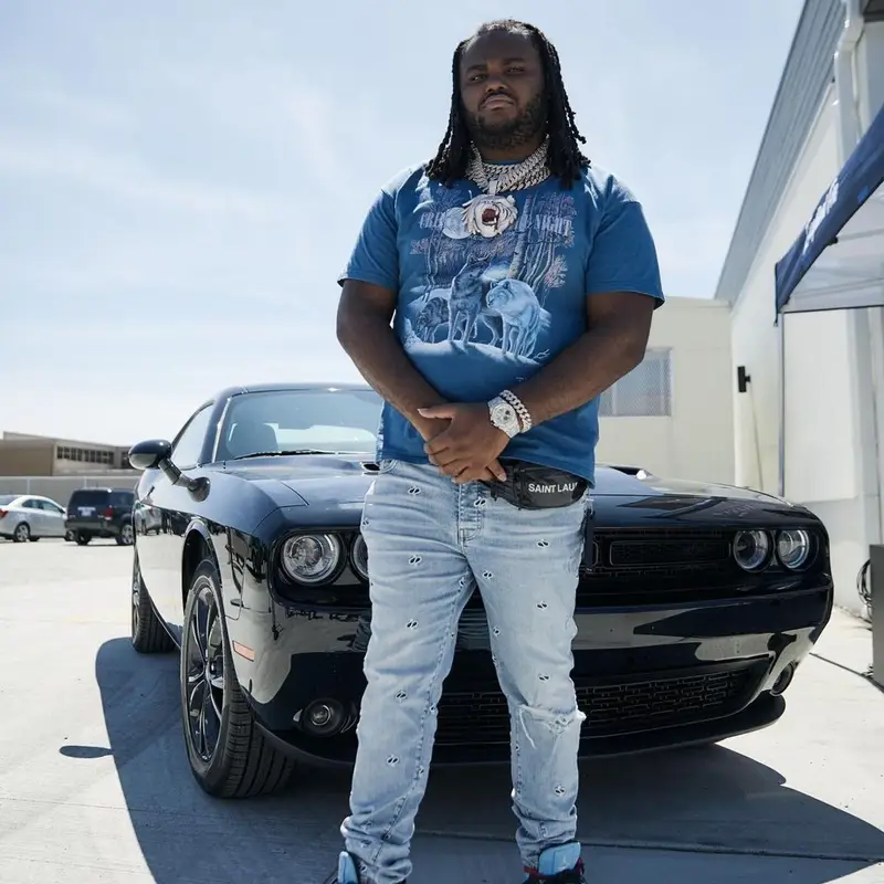 Tee Grizzley outfit in Amiri, Jordan, and Saint Laurent, 2021