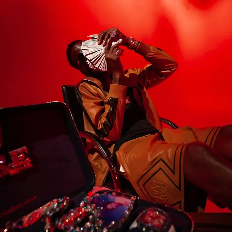 Young Dolph outfit in Amiri, Jordan, and Off-White, 2021