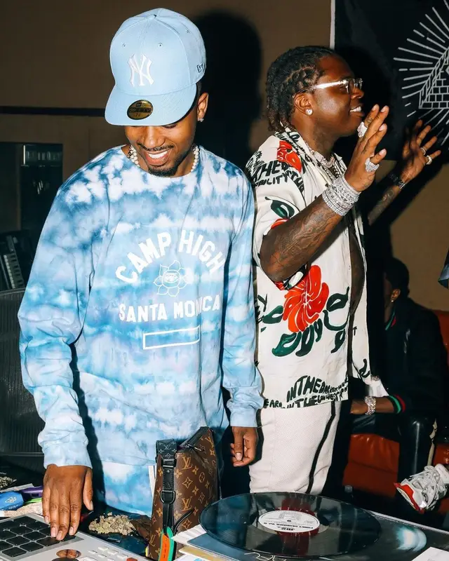 Metro Boomin outfit in Camp High, Louis Vuitton, and New Era, 2021