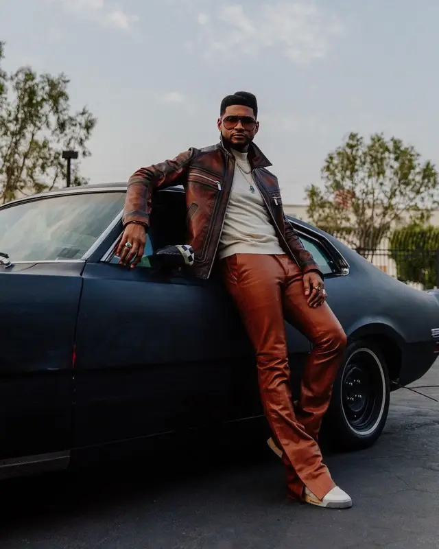 Usher outfit in Amiri, Maison Margiela, and Berluti, 2021
