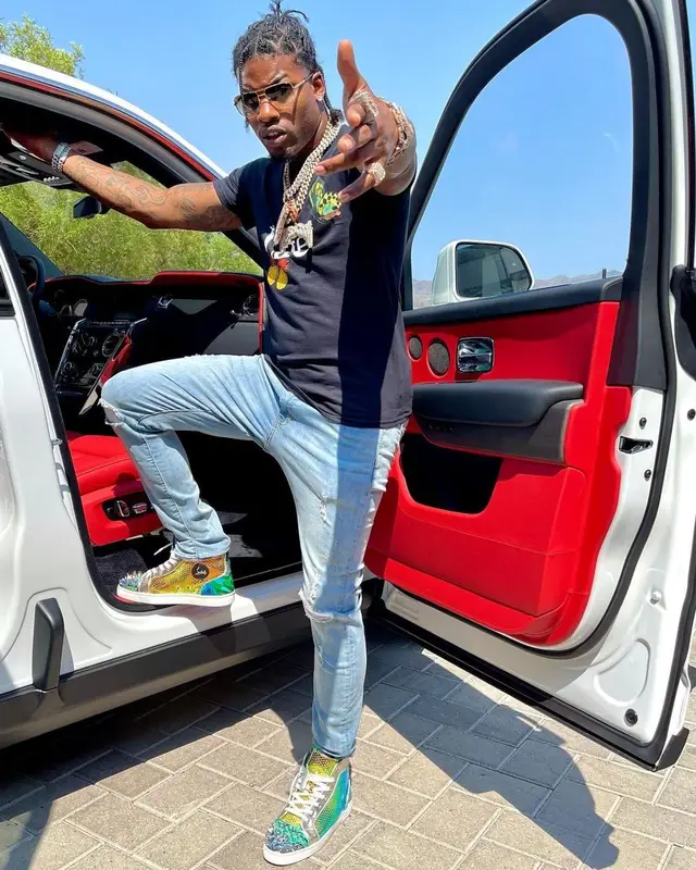 CJ So Cool outfit in FashionNova, Christian Louboutin, and Louis Vuitton, 2021