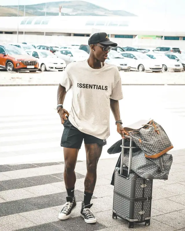 Dennis Schroder outfit in Fear of God, Nike, and Converse, 2021