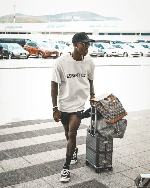Dennis Schroder outfit in Fear of God, Nike, and Converse, 2021