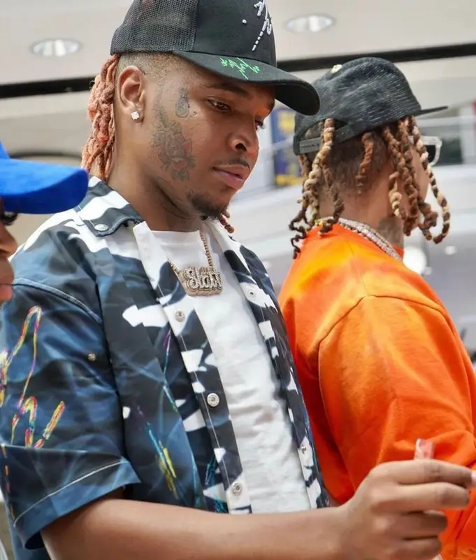 Lil Keed outfit in Vicaire, Suicoke, and John Elliott, 2021