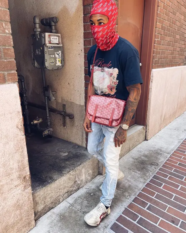 DDG outfit in Rhude, Goyard, and Awful Lot of Cough Syrup, 2021