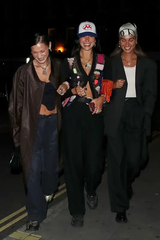 Dua Lipa outfit in Puma, Saint Laurent, and Mowalola, 2021