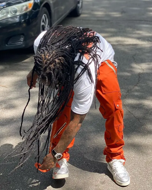 Jacquees outfit in Juice Wrld Merch, Cartier, and Vlone, 2021