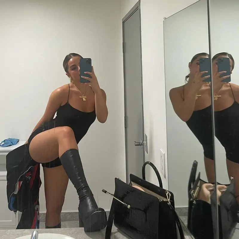 Addison Rae outfit in Naked Wolfe, Strathberry, and Naked Wardrobe, 2021