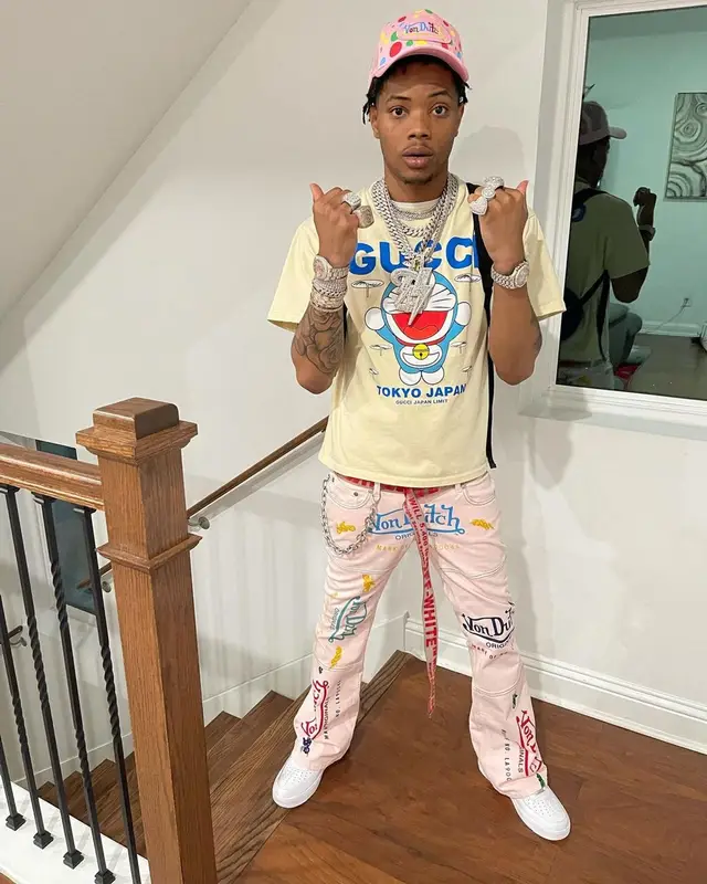 Lil Migo outfit in Gucci, Von Dutch, and Doraemon, 2021
