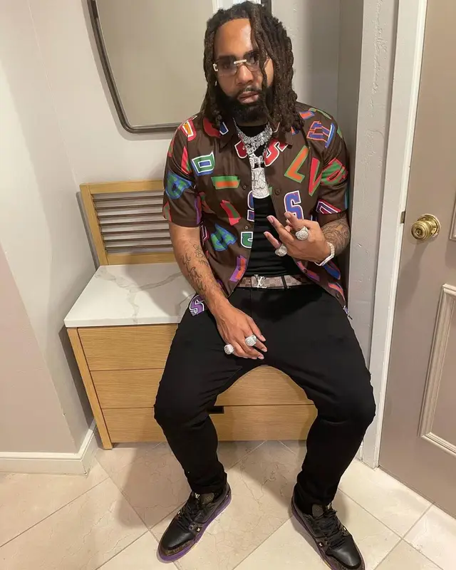 Money Man outfit in Louis Vuitton, Amiri, and NBA, 2021