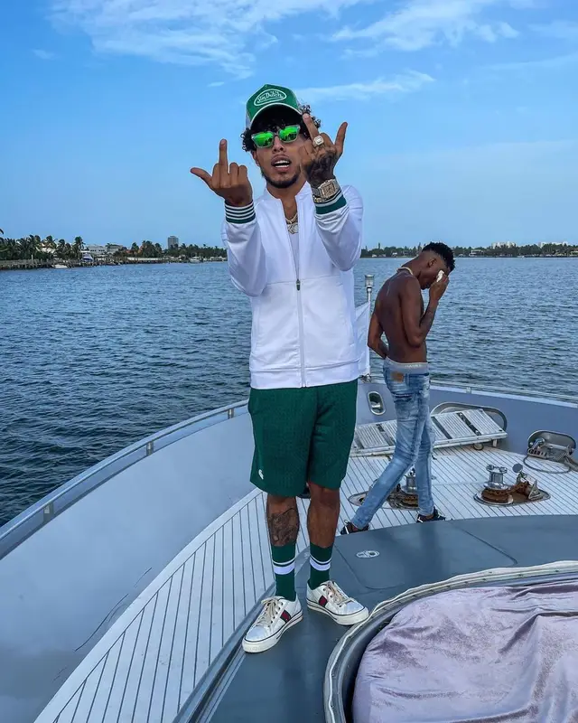 King Cid outfit in Gucci, Von Dutch, and Lacoste, 2021