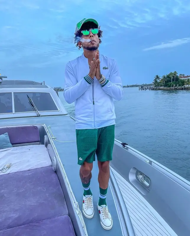 King Cid outfit in Gucci, Von Dutch, and Lacoste, 2021