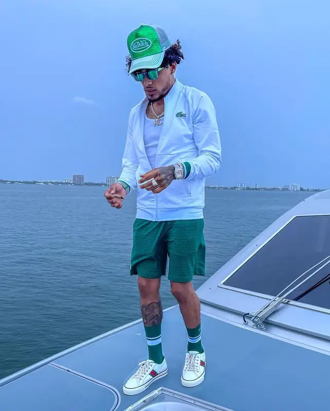 King Cid outfit in Gucci, Von Dutch, and Lacoste, 2021