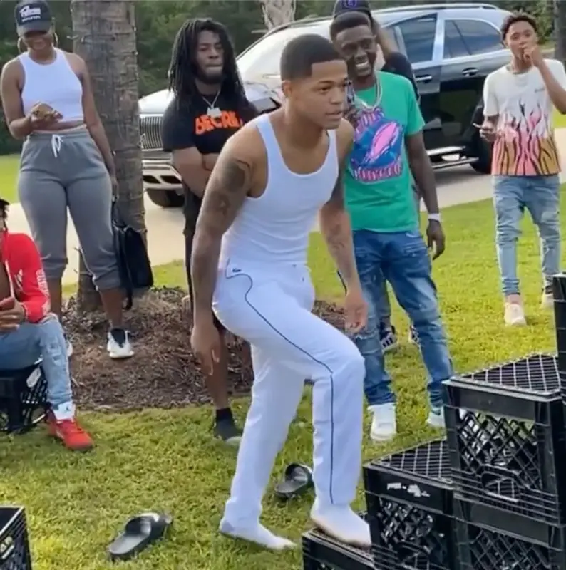 YK Osiris outfit in Hanes, Lacoste, and No Name, 2021