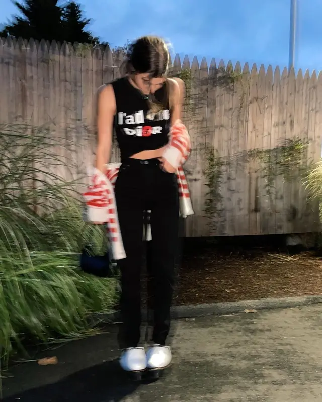 Charli D'Amelio outfit in Dior, Dr. Martens, and By Far, 2021