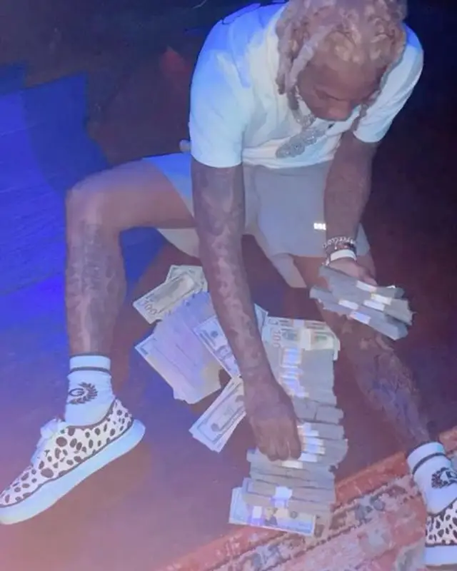 Lil Durk outfit in Off-White, Fear of God, and Dolce & Gabbana, 2021