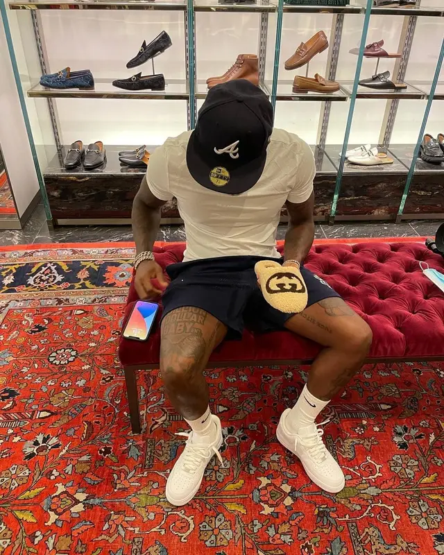 DaBaby outfit in Eric Emanuel, New Era, and Nike, 2021