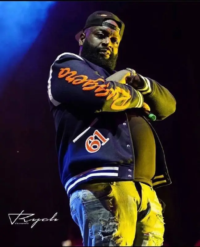Rick Ross outfit in Amiri, Jordan, and New Era, 2021