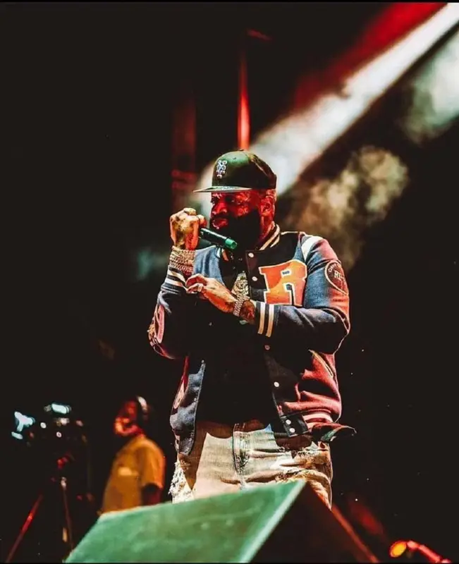 Rick Ross outfit in Amiri, Jordan, and New Era, 2021