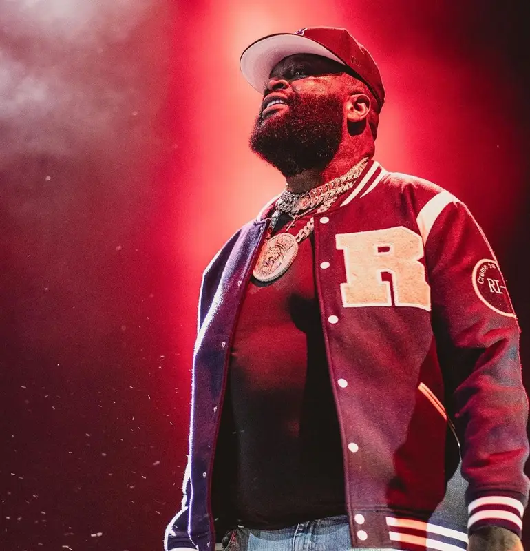 Rick Ross outfit in Amiri, Jordan, and New Era, 2021