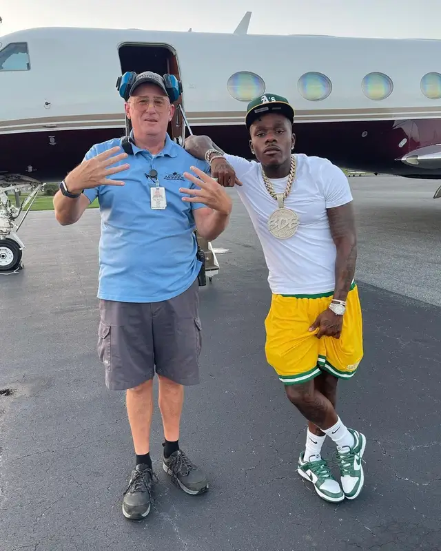 DaBaby outfit in Hanes, Stadium Goods, and New Era, 2021