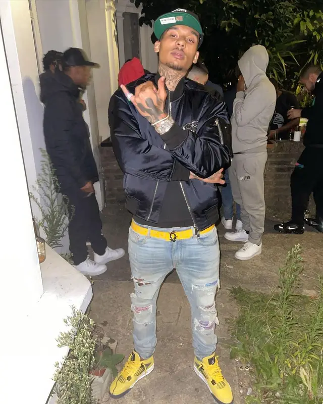 Fredo outfit in Dior, Amiri, and New Era, 2021