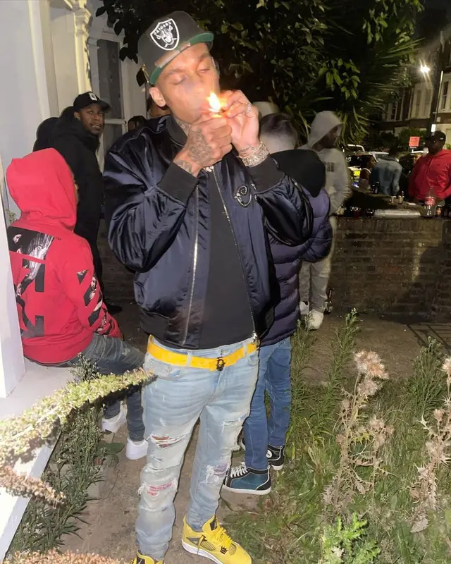 Fredo outfit in Dior, Amiri, and New Era, 2021