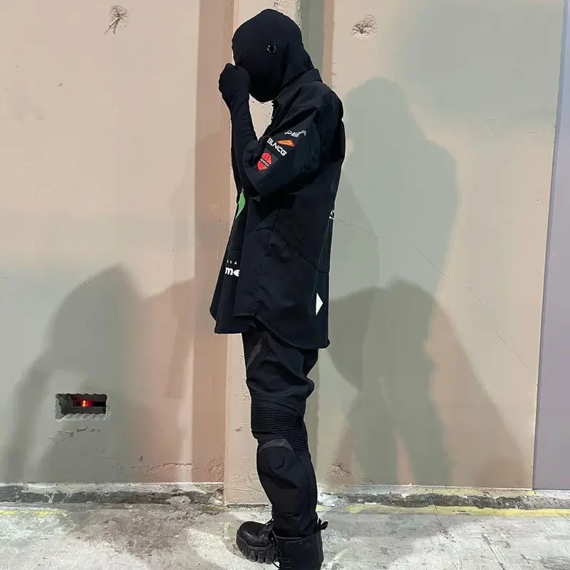 Playboi Carti outfit in Balenciaga and Kanye West Merch, 2021