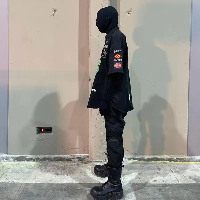 Playboi Carti outfit in Balenciaga and Kanye West Merch, 2021