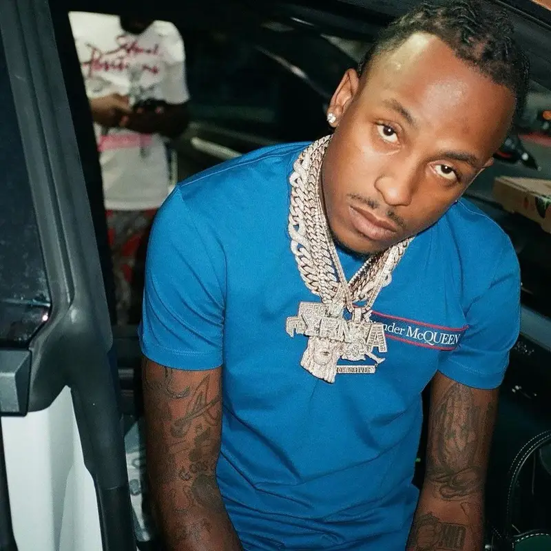 Rich The Kid outfit in Alexander McQueen, Gallery Dept., and Jordan, 2021