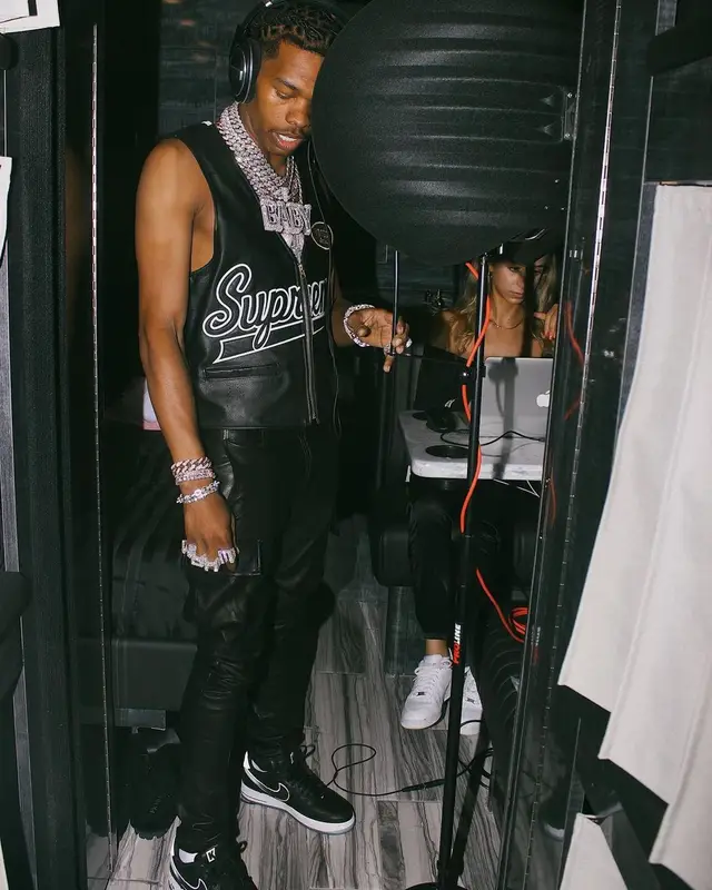 Lil Baby outfit in Supreme, Amiri, and Nike, 2021