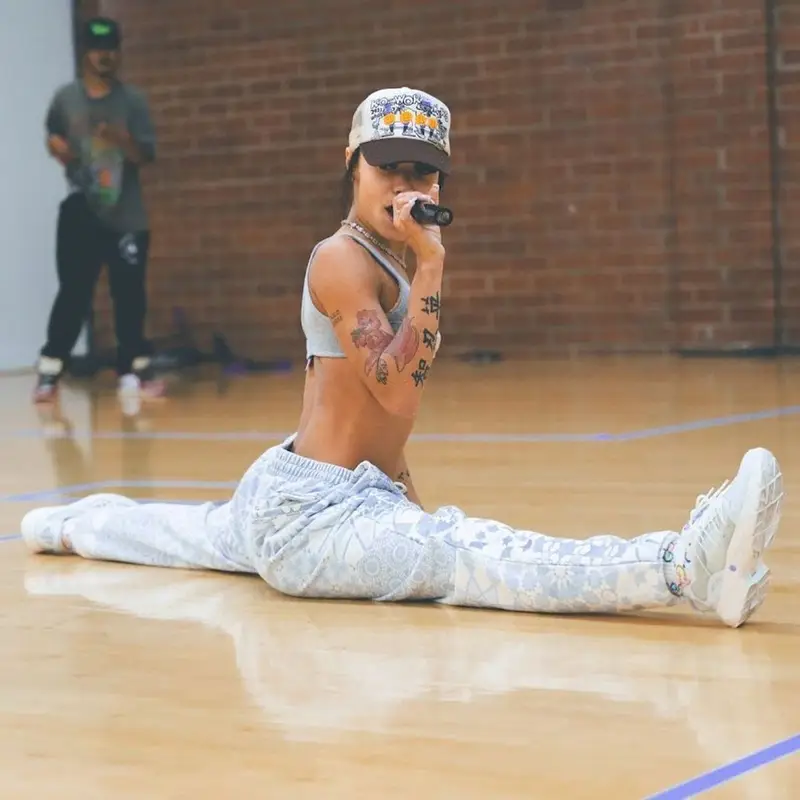 Coi Leray outfit in Kith, Kapital, and Halo Rise Above, 2021