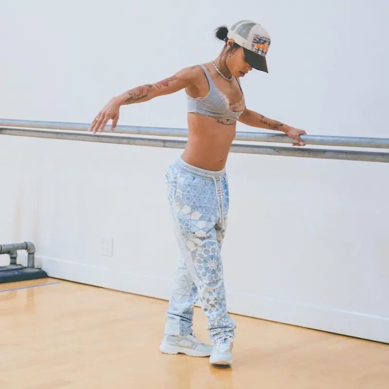 Coi Leray outfit in Kith, Kapital, and Halo Rise Above, 2021