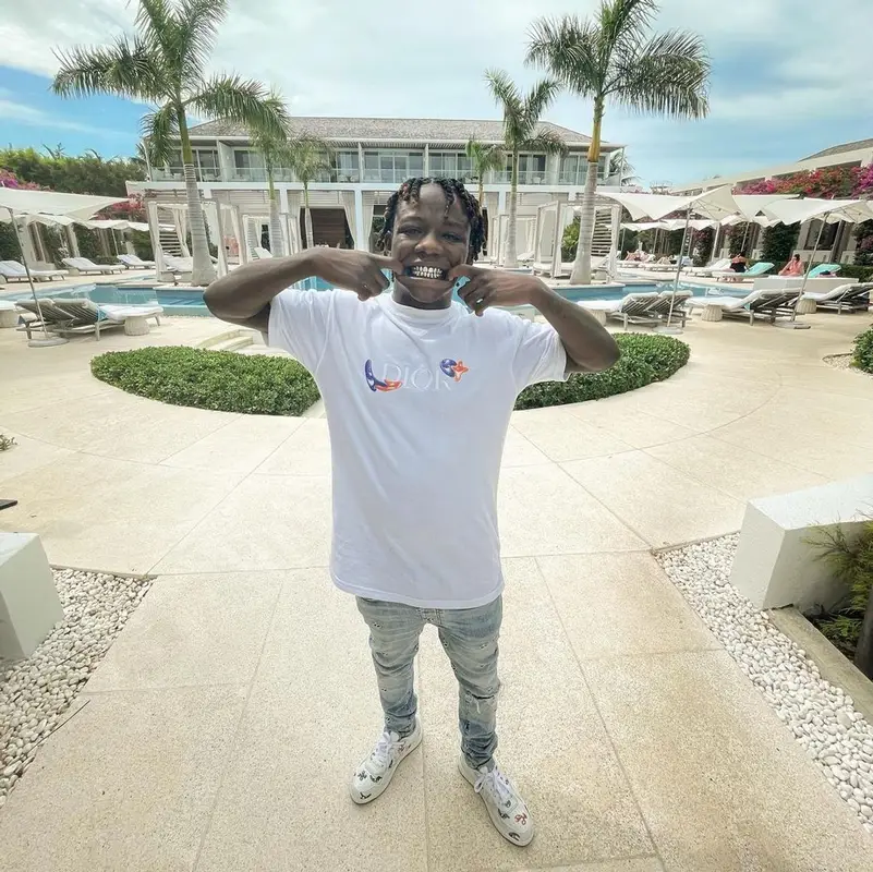 Jackboy outfit in Dior, Amiri, and Kenny Scharf, 2021