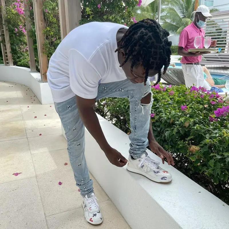 Jackboy outfit in Dior, Amiri, and Kenny Scharf, 2021