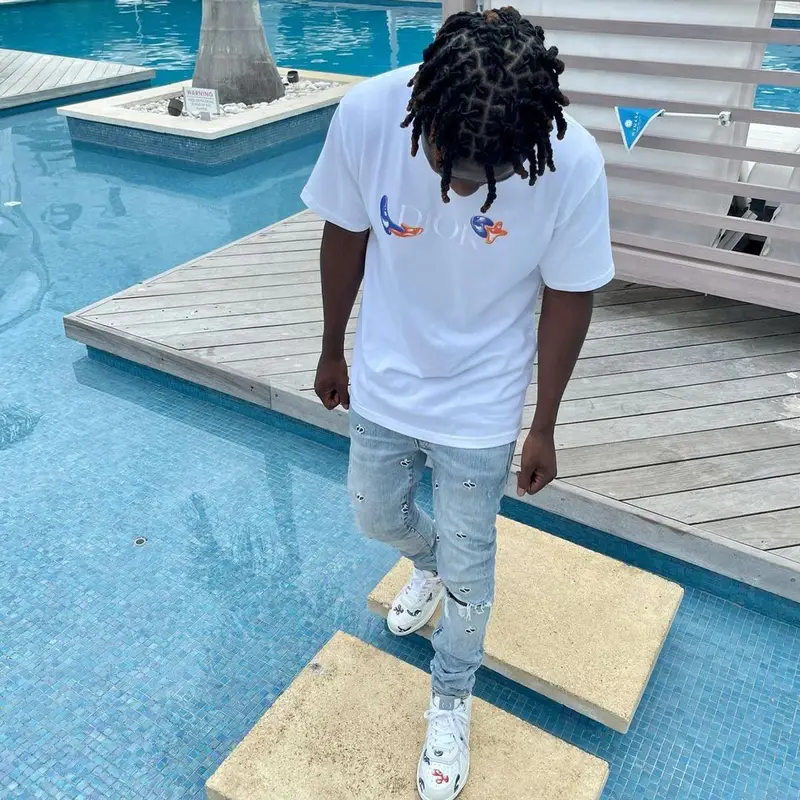 Jackboy outfit in Dior, Amiri, and Kenny Scharf, 2021