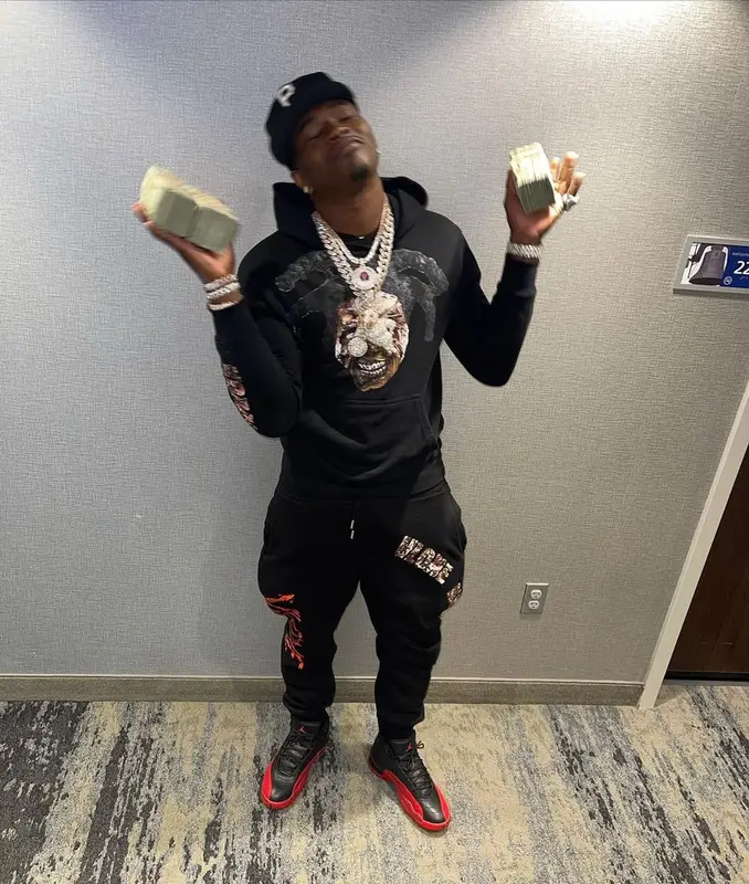 Bankroll Freddie outfit in Vlone, Jordan, and New Era, 2021