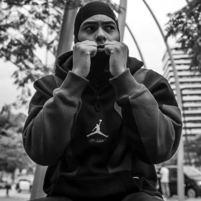 Myke Towers outfit in Jordan, Nike, and Off-White, 2021