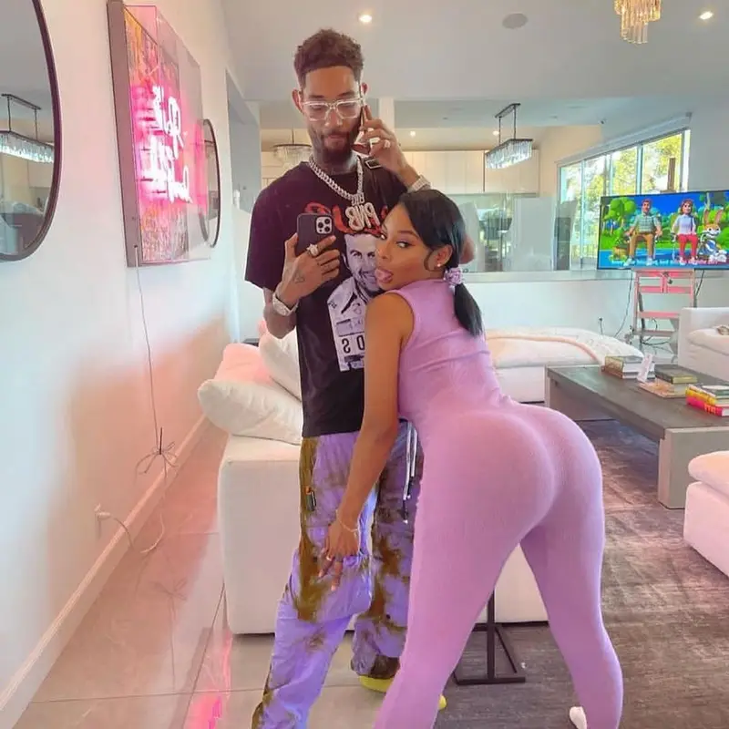 PnB Rock outfit in Catchy Design Studio, Palm Angels, and Louis Vuitton, 2021