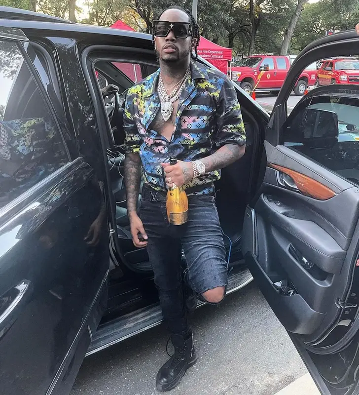 Fivio Foreign outfit in Amiri, Louis Vuitton, and Tom Ford, 2021
