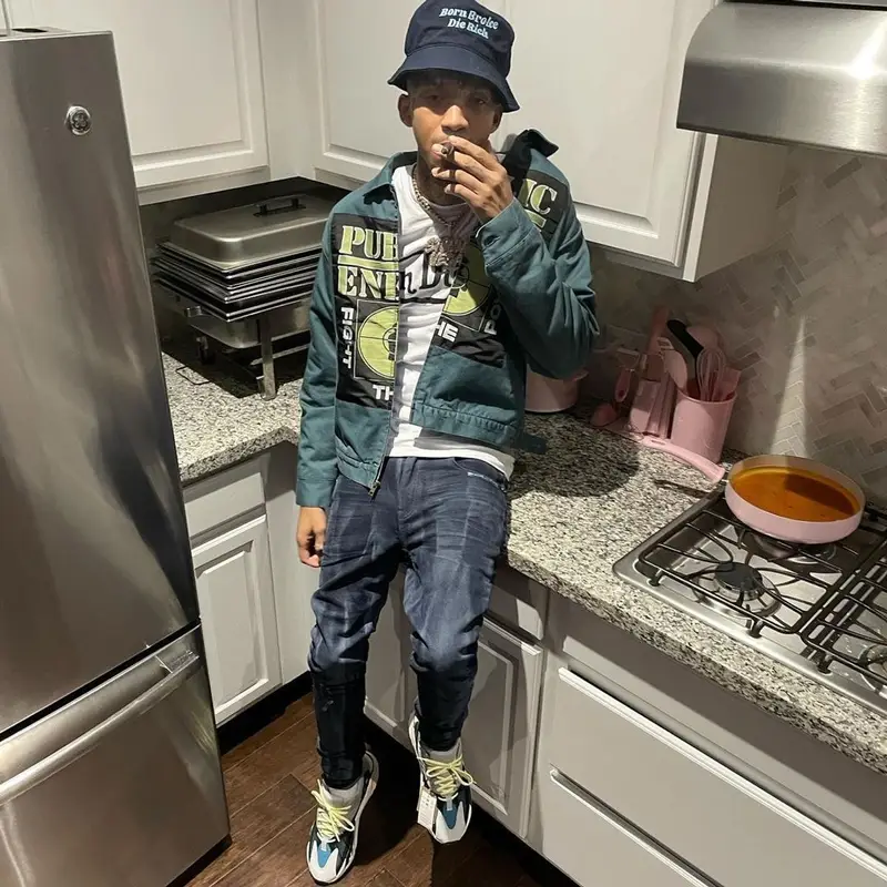 Stunna 4 Vegas outfit in Supreme, Von Dutch, and Undercover, 2021