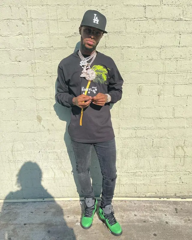 Toosii outfit in Off-White, Cartier, and New Era, 2021