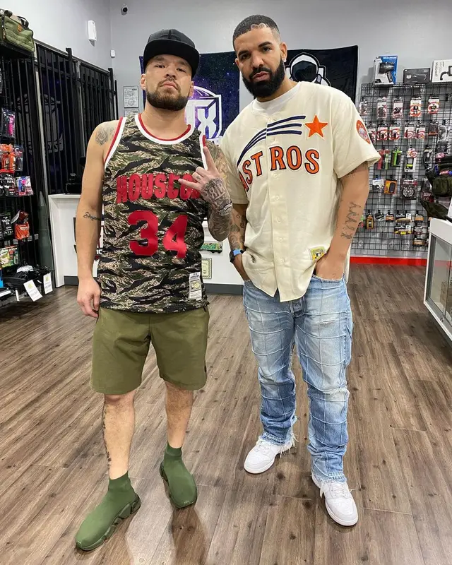 Drake outfit in Mitchell & Ness, Gallery Dept., and Nike, 2021
