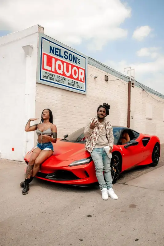 Mozzy outfit in Gucci, Stadium Goods, and The North Face, 2021