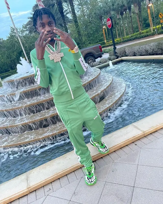 Lil Tjay outfit in Palm Angels, Balenciaga, and Richard Mille, 2021