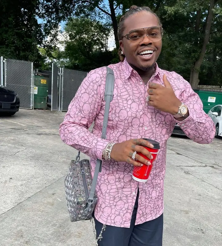Gunna outfit in Comme Des Garcons, Bottega Veneta, and   Kaws, 2021