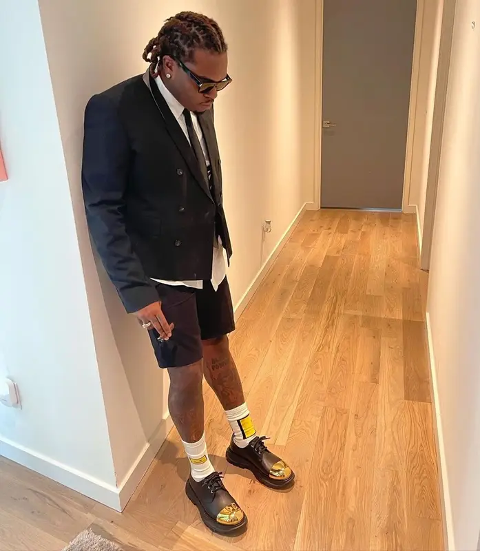 Gunna outfit in Alyx, Louis Vuitton, and Alexander McQueen, 2021